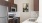 a kitchen with a stove and microwave